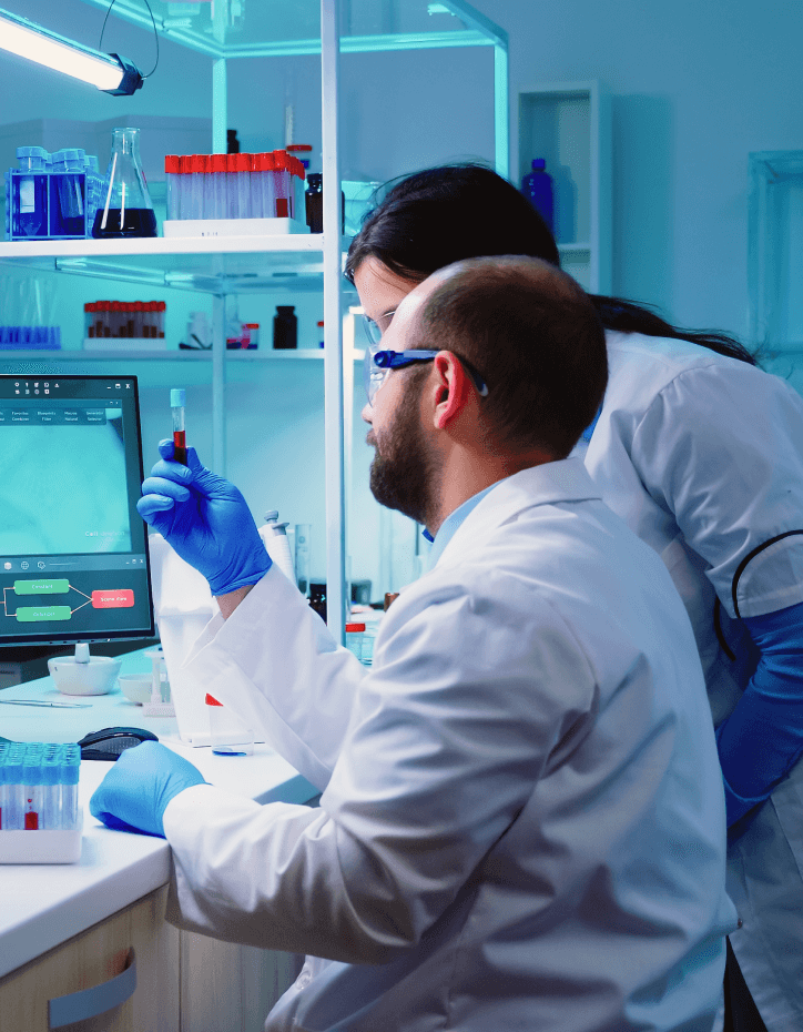 Pharmaceutical scientists reviewing laboratory evidence